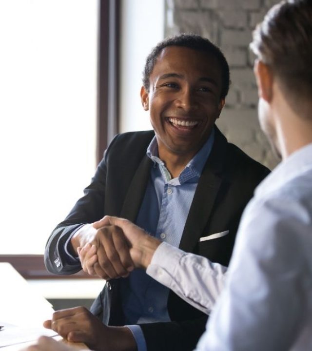 Insurance Marketplace in Rochester Cares - Two people shaking hands