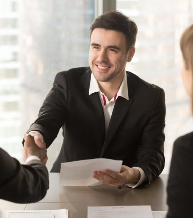 insurance-agent-shaking-hands-with-client insurance-agent-shaking-hands-with-client